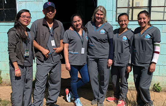 Lisa Thompson poses with some of the team in Guatemala.